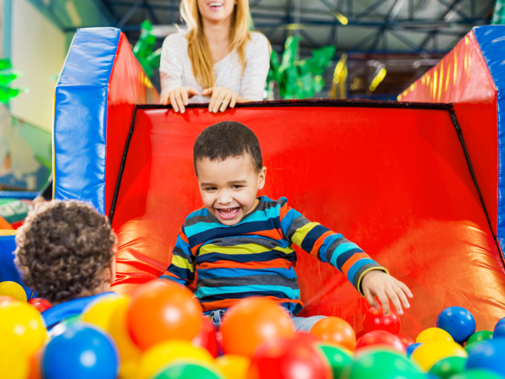 Child in inflatable slide