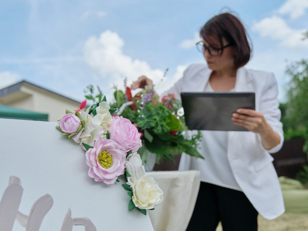 Woman arranging flowers